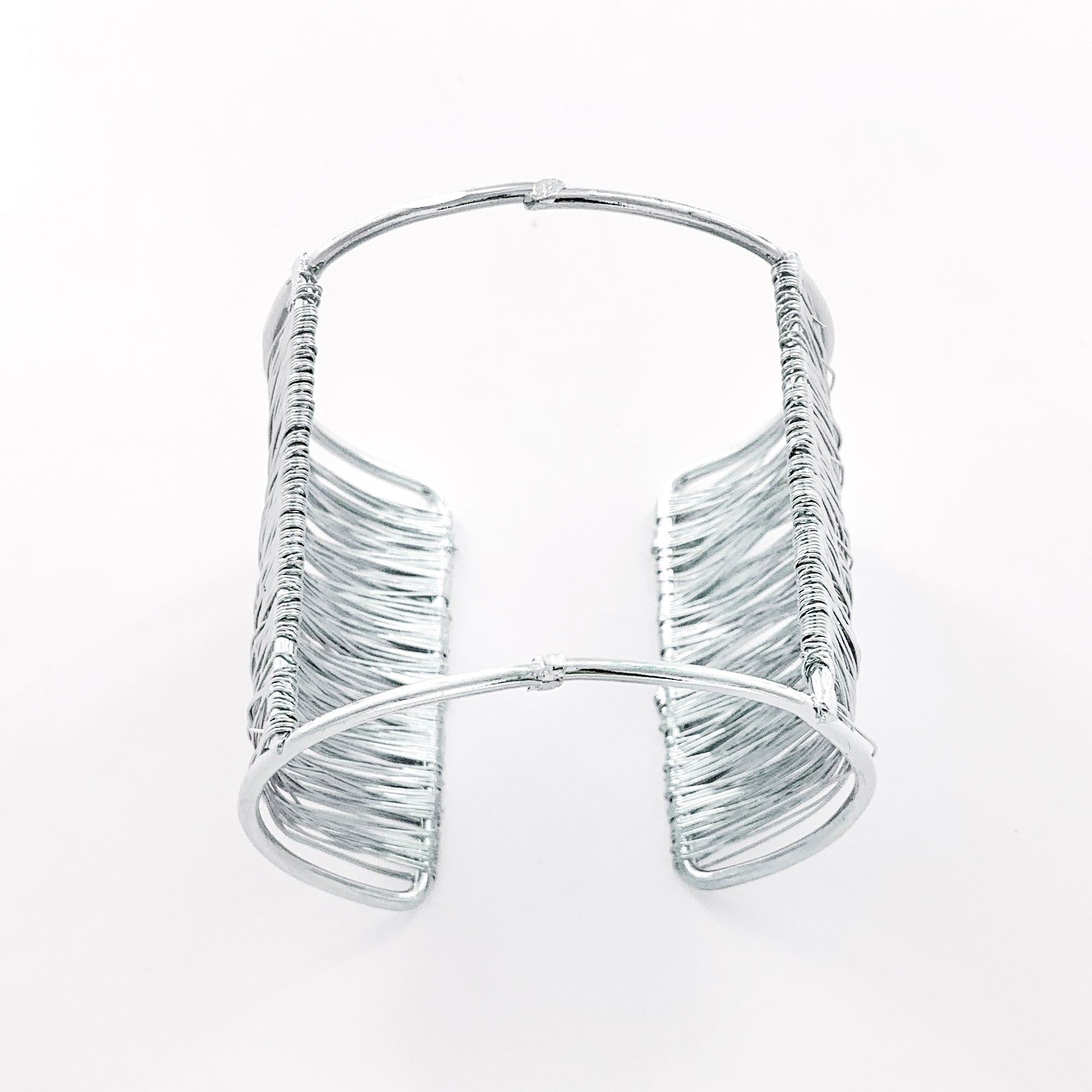 Silver cuff with twisted mesh design