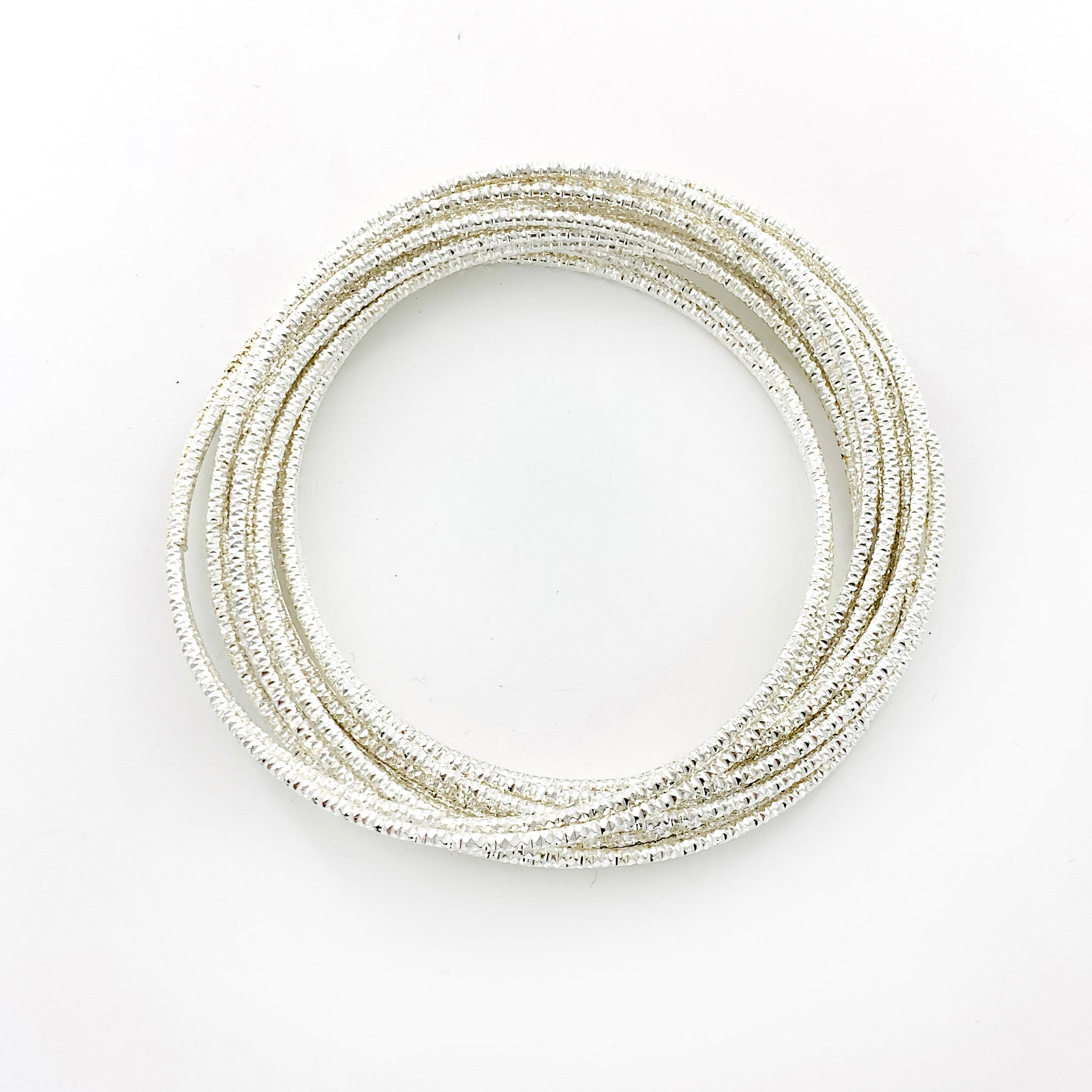 Textured white silver bangles