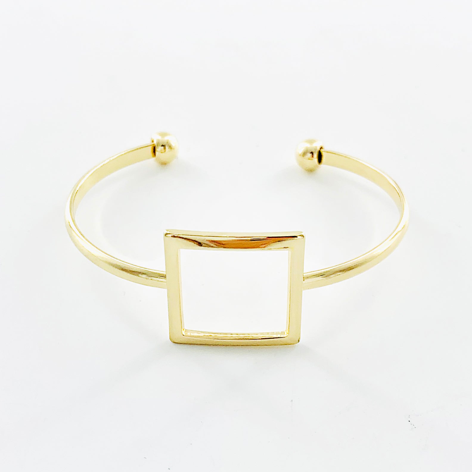 Thin gold bangles with hollow square design