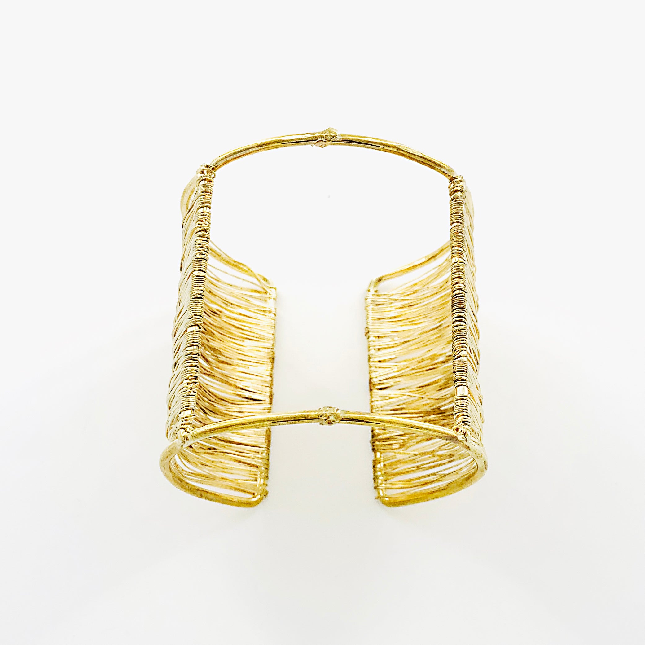 Gold cuff with twisted mesh design