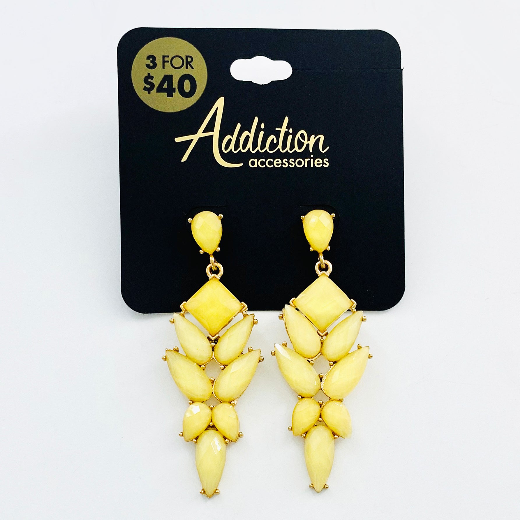Earrings with faceted yellow teardrops