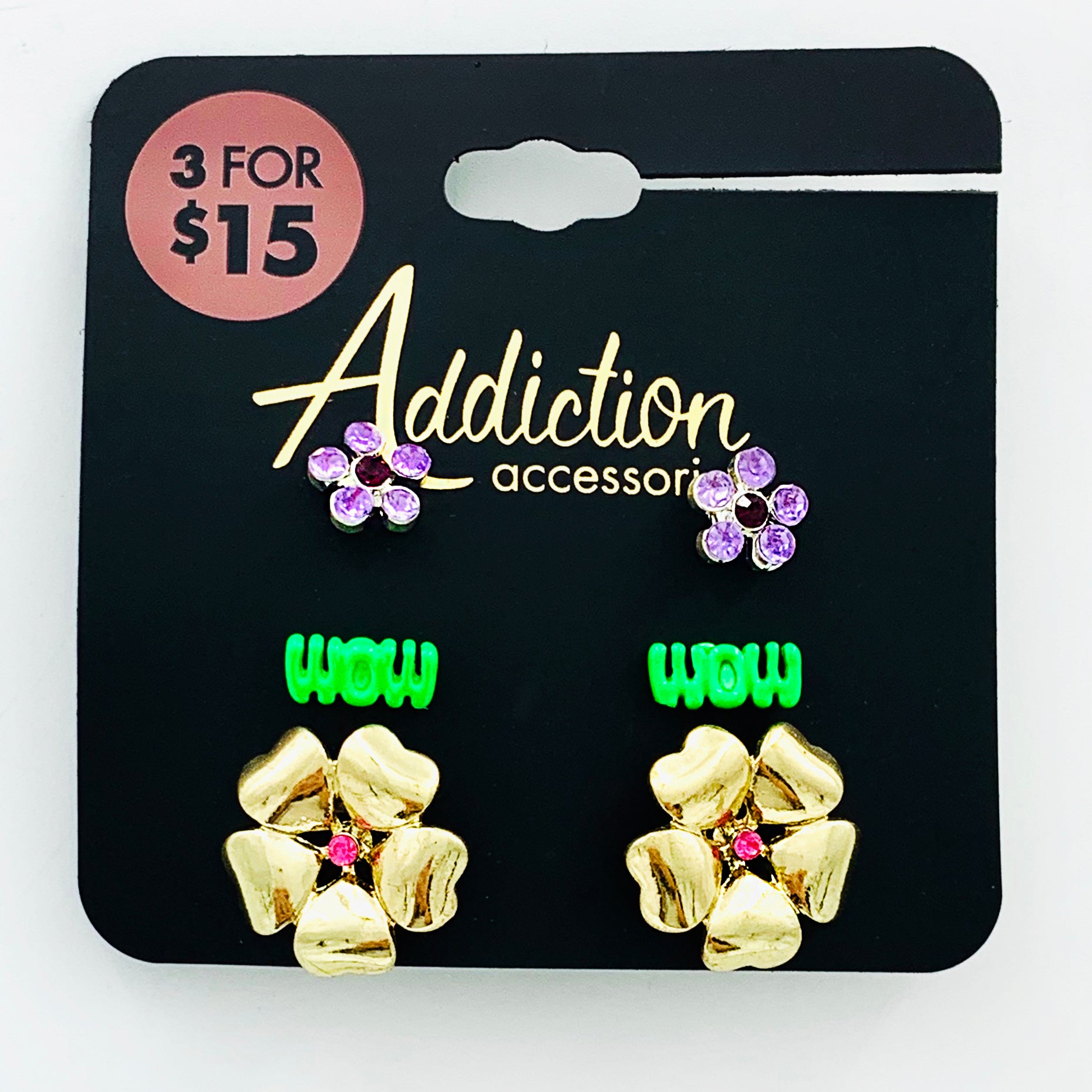 Gold flower, wow and purple gem earrings