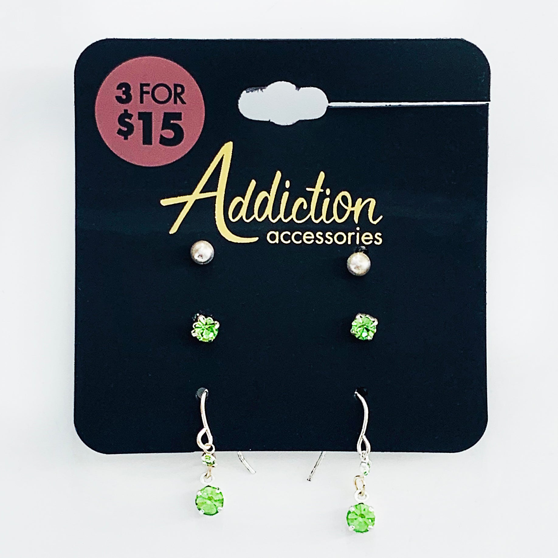 Set of earrings with green gems