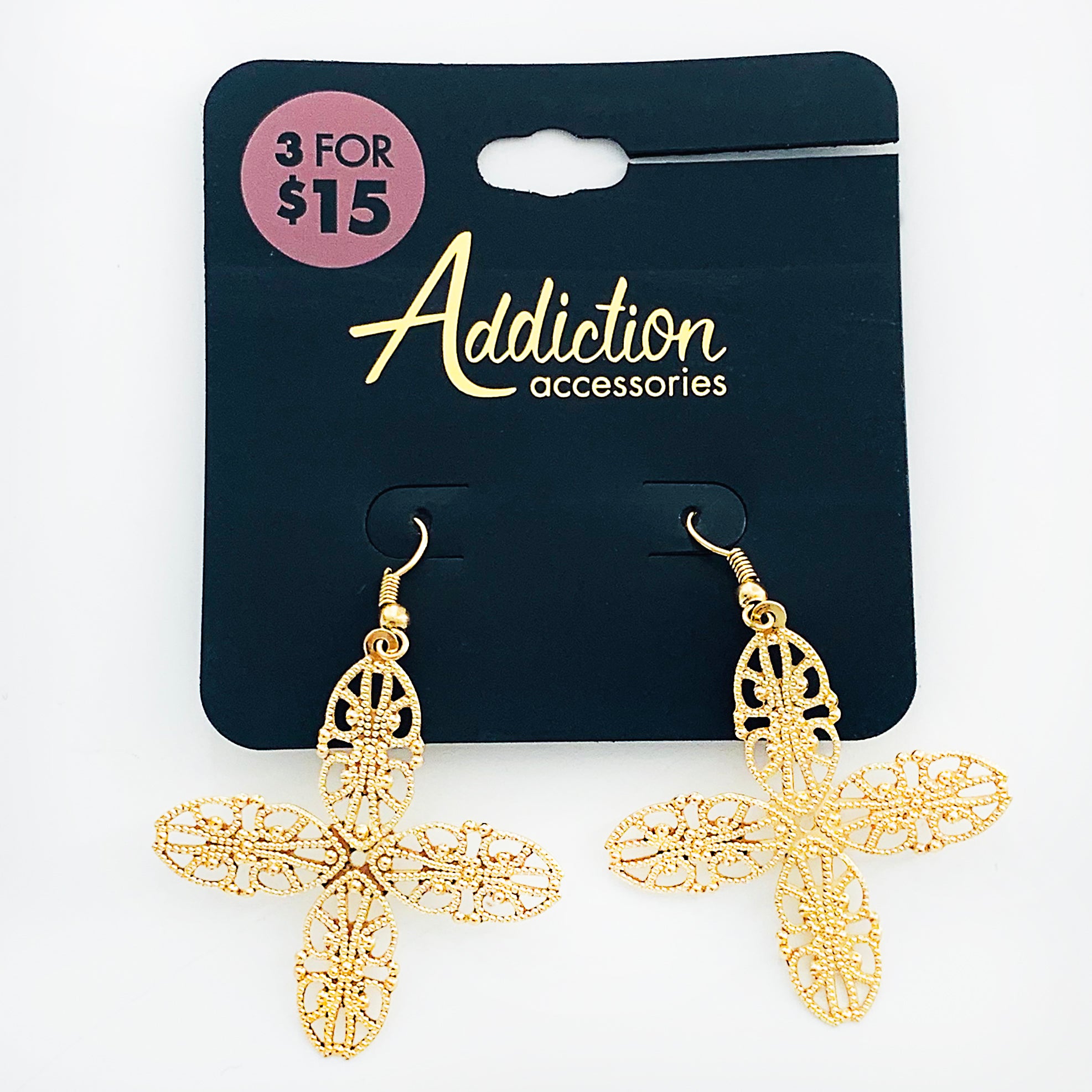 Ornate gold cross dangling earrings