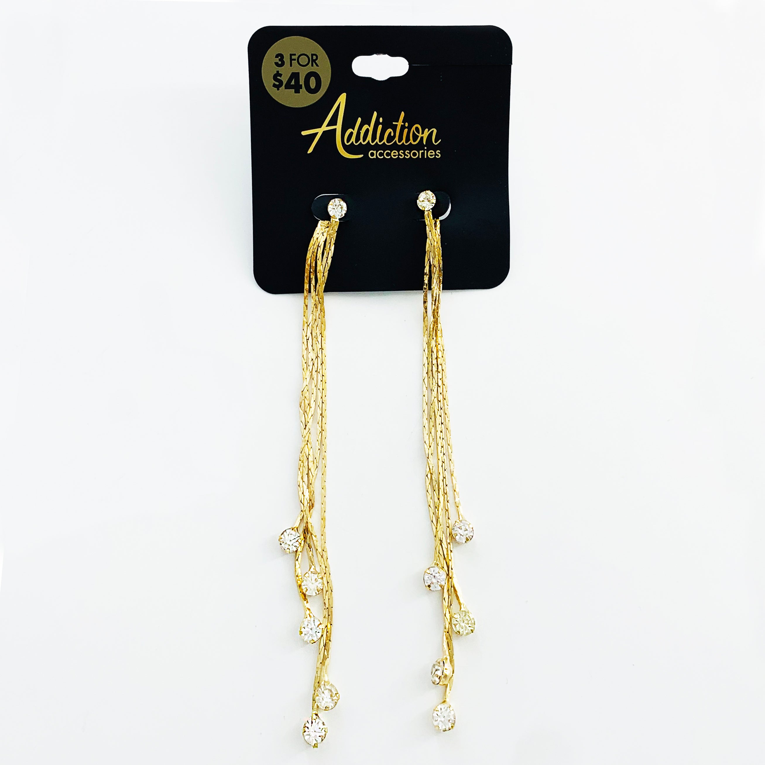 Long gold earrings with diamante tips