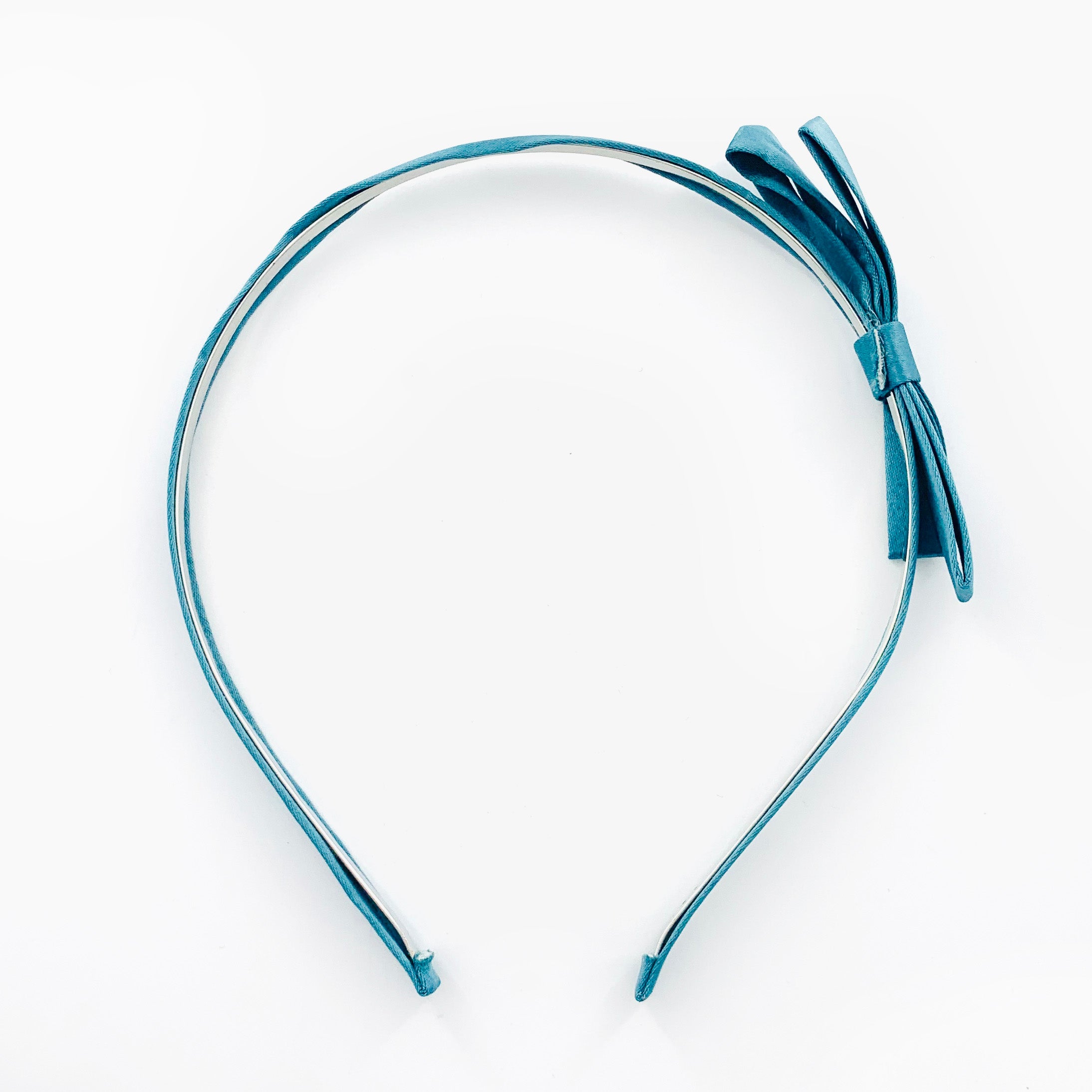 Thin teal fabric hairband with teal satin ribbon