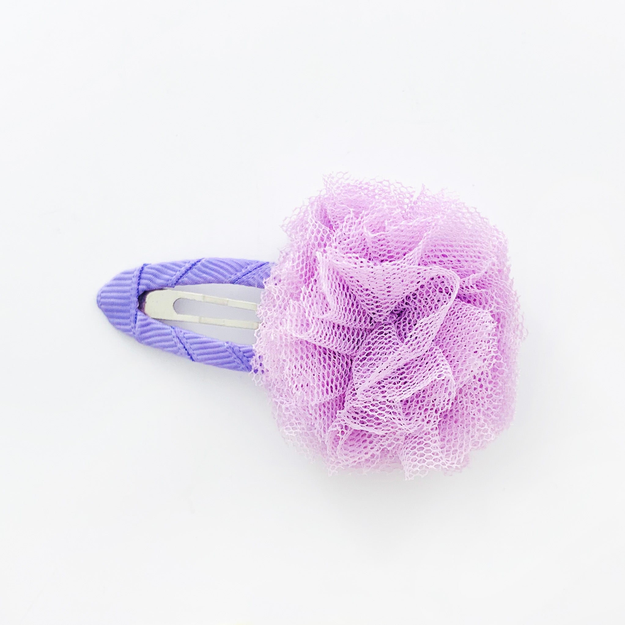 Hair clip with fluffy fabric lilac pom pom
