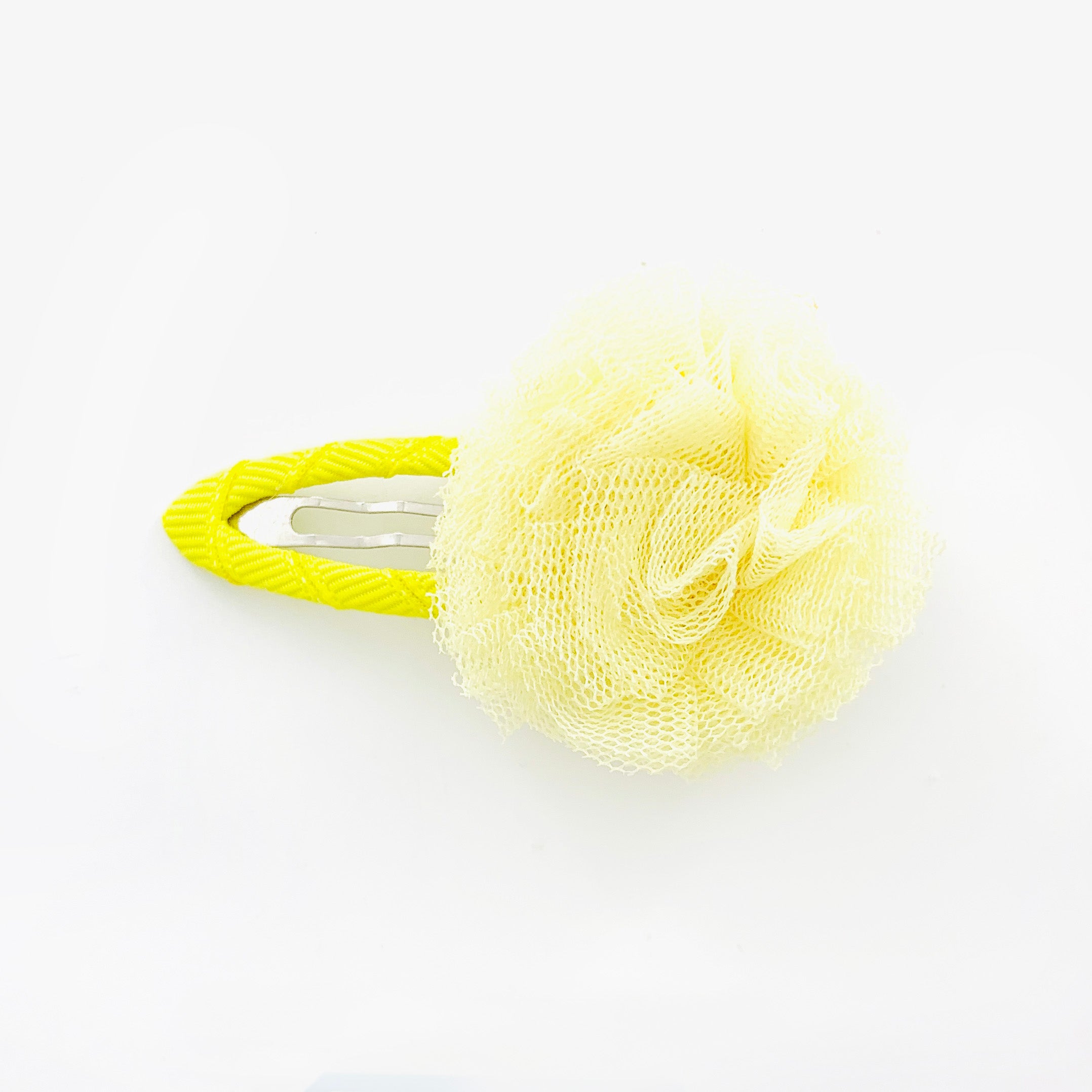 Hair clip with fluffy fabric yellow pom pom