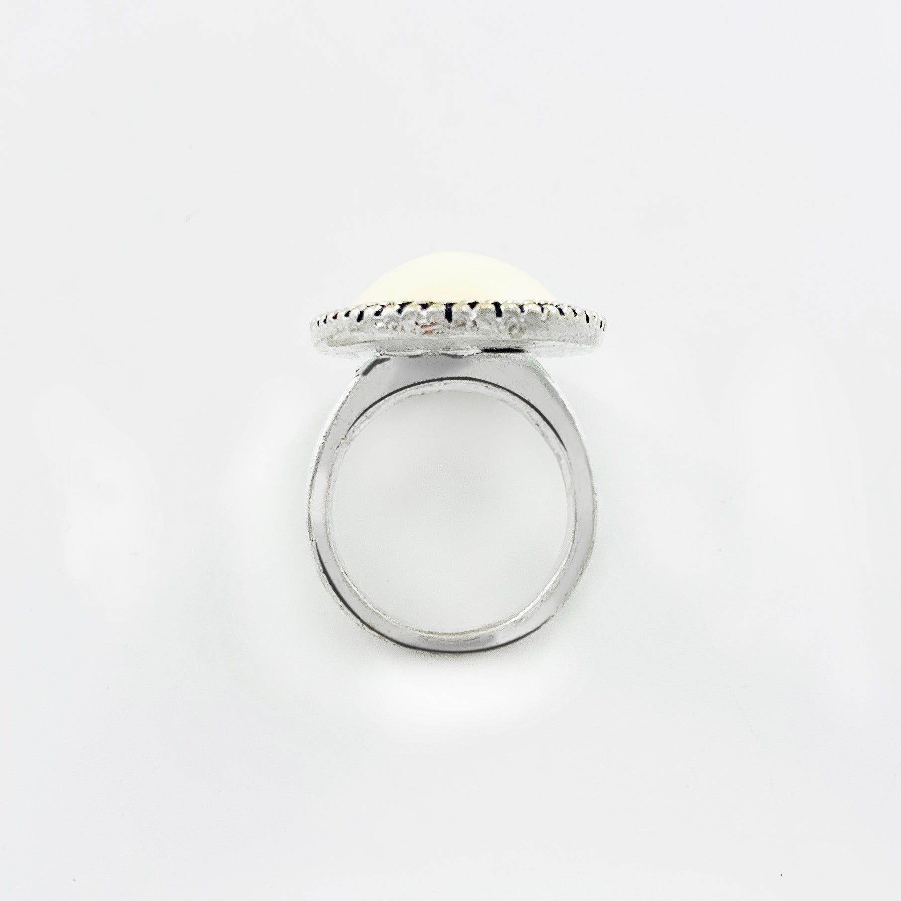 Silver ring with large ivory-coloured stone