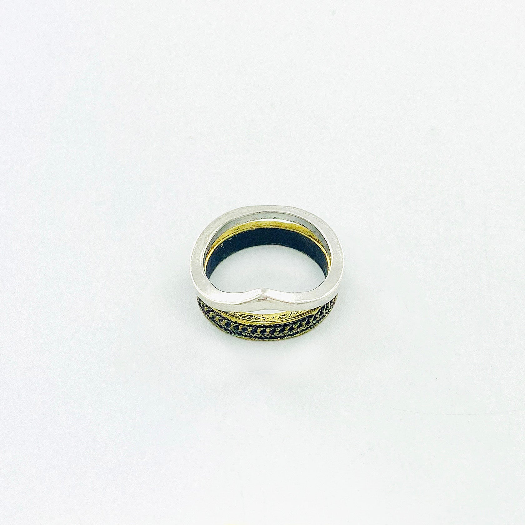 Silver V ring with rustic gold ring