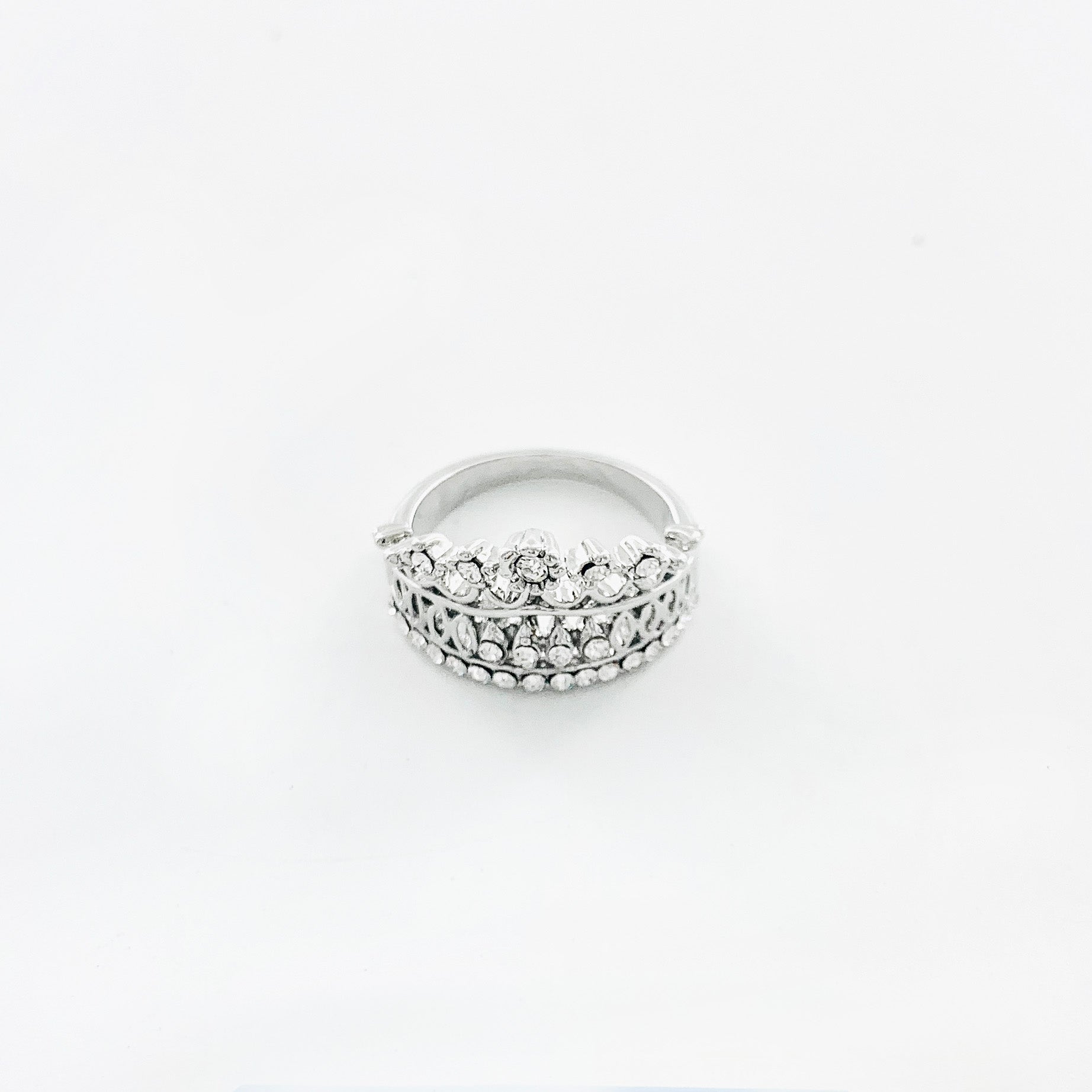 Silver crown ring design with layers of diamante stones
