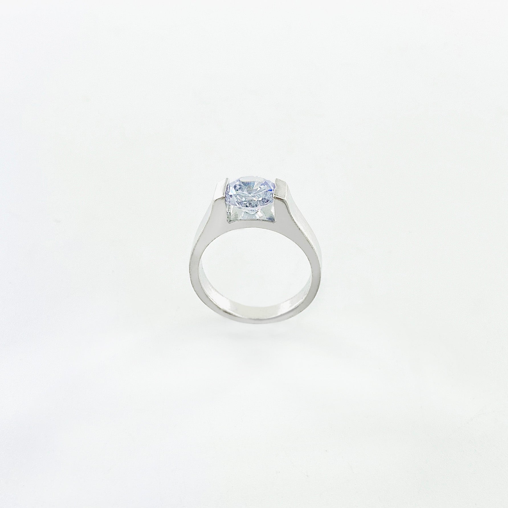 Silver ring with blue-tinged crystal stone