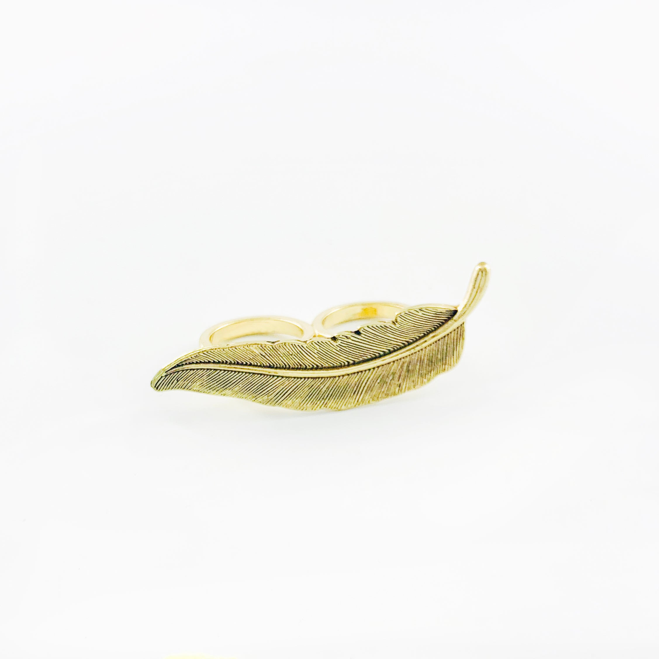 Large gold ring with leaf design