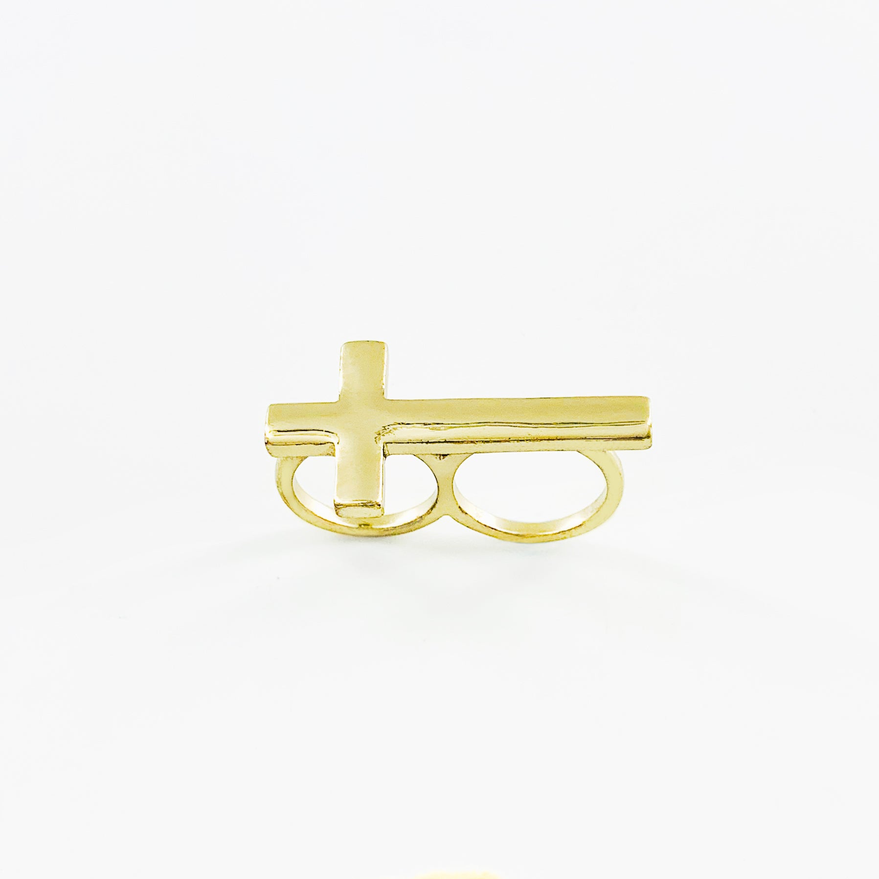 Gold ring with cross design