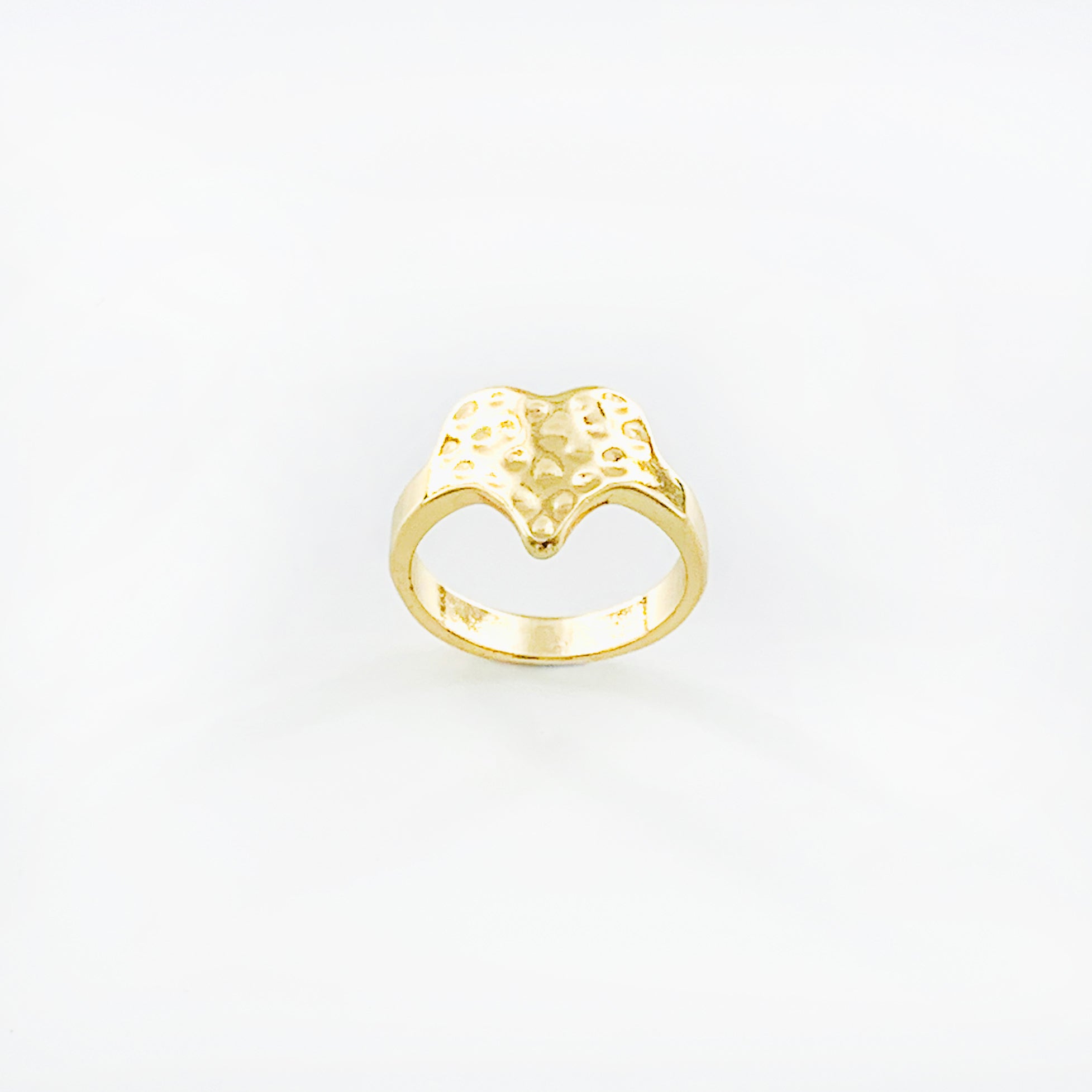 Gold ring with textured heart