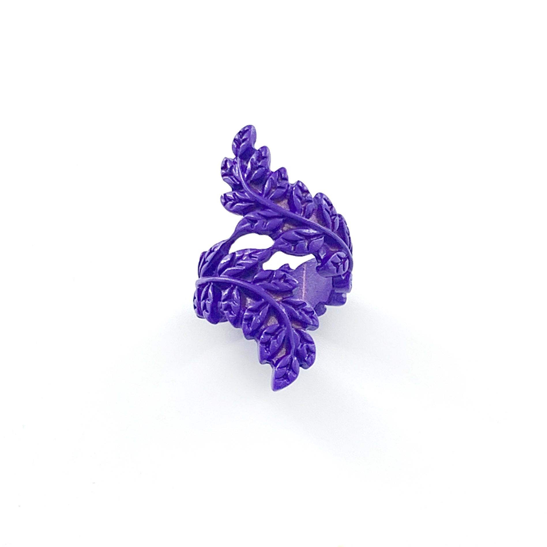 Purple coloured ring with twisted leafy design