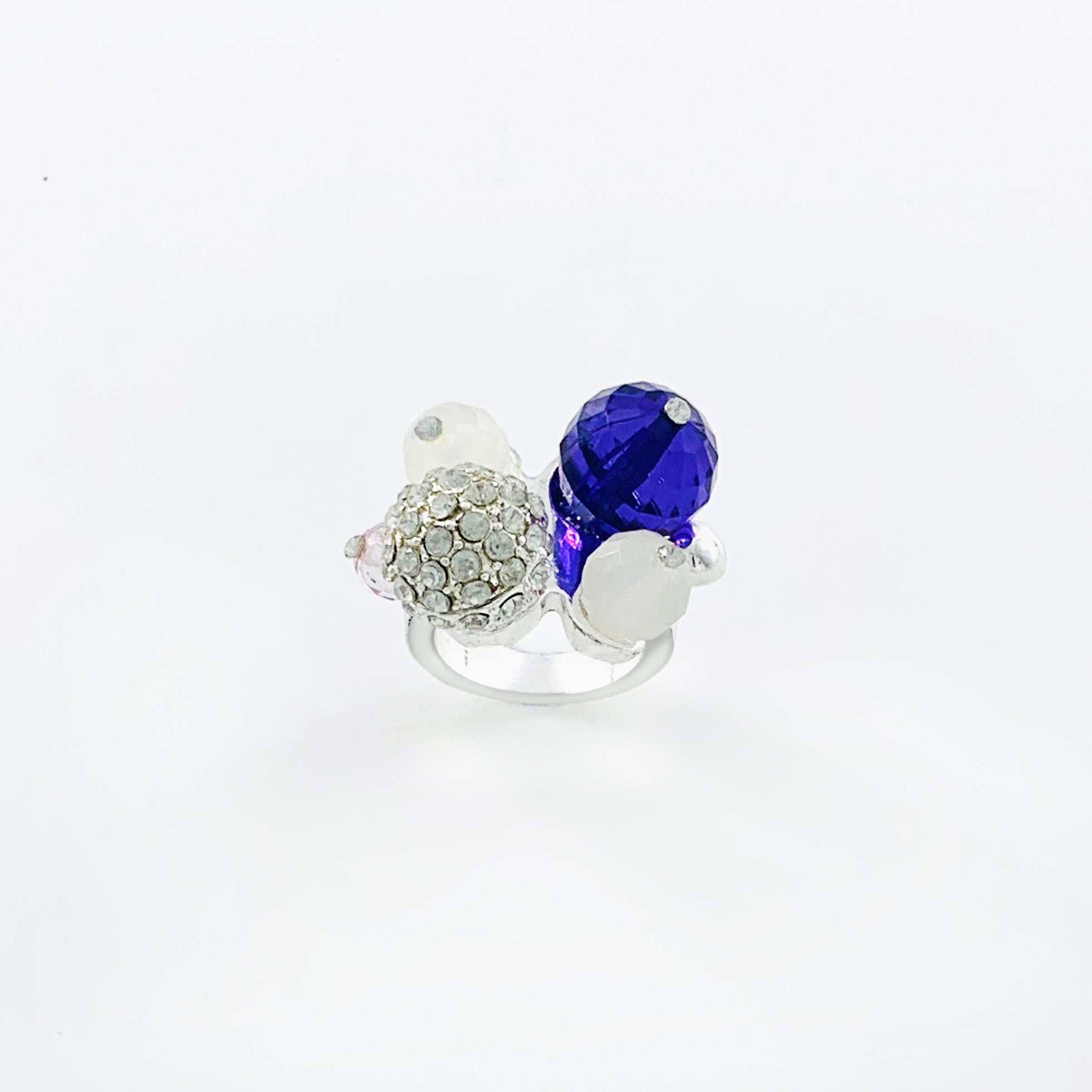 Silver ring with cluster of coloured stones and diamantes
