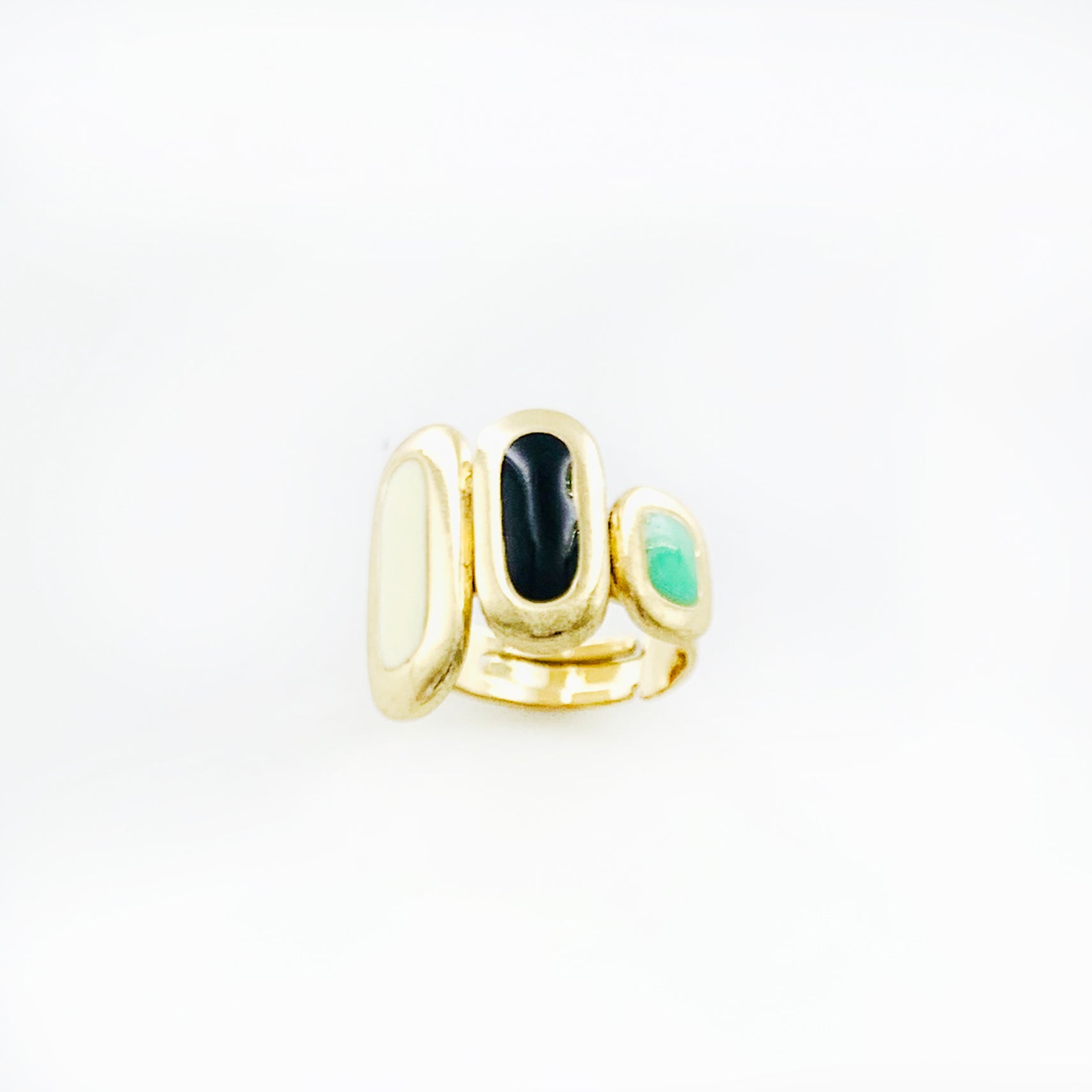 Gold ring with black, turquoise and white