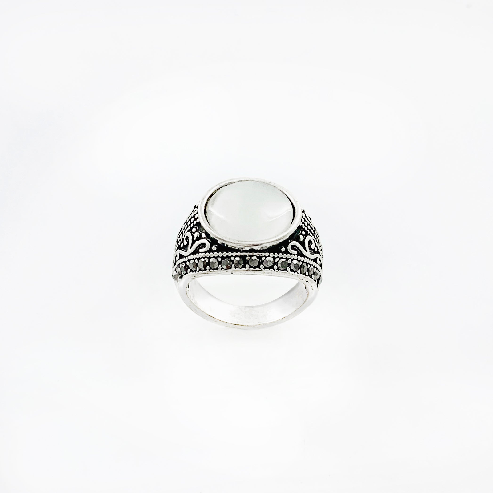 Art deco inspired silver ring with white cateye stone